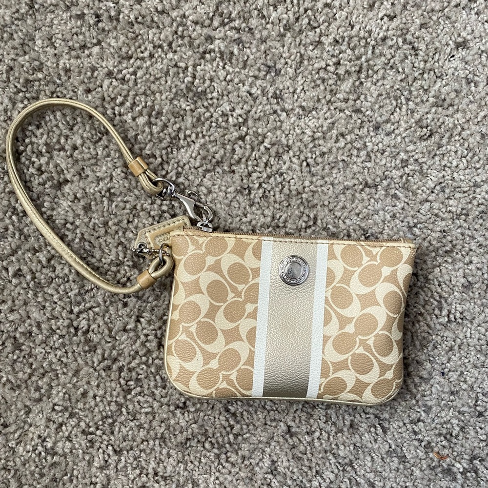 Gold coach wristlet